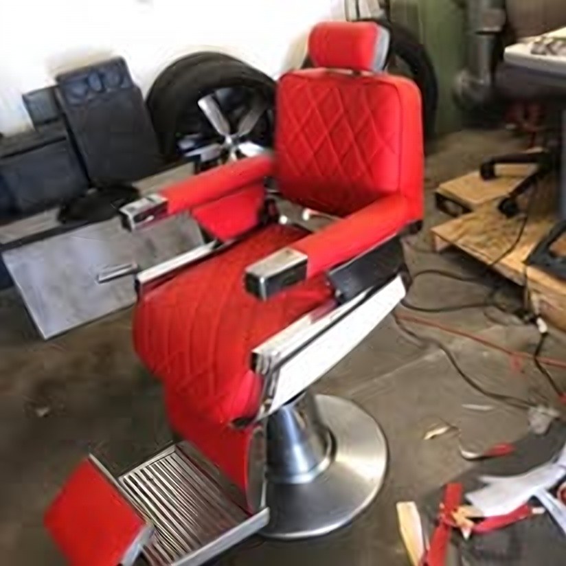 Commercial chair reupholstered in red diamond-stitched vinyl